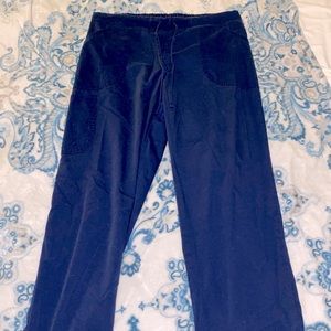 Navy blue scrub pants.